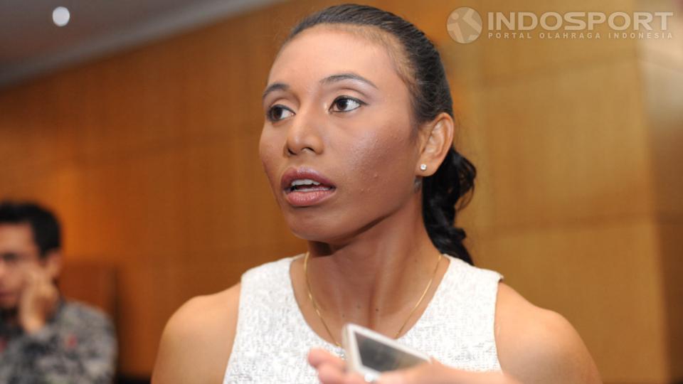 Jadi ratu lompat jauh dan lompat jangkit Indonesia, Maria Natalia Londa, membidik emas keenam dalam partisipasi kedelapan di SEA Games 2023 Kamboja. - INDOSPORT